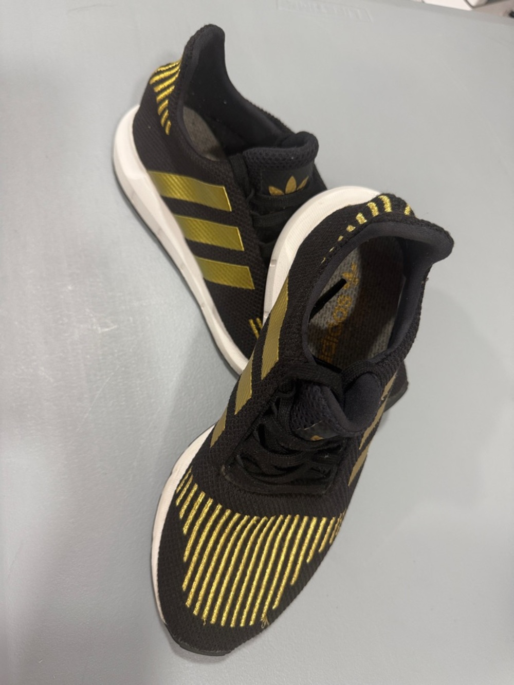 adidas Black and Gold Knit Running Shoes.    Size 8.5
